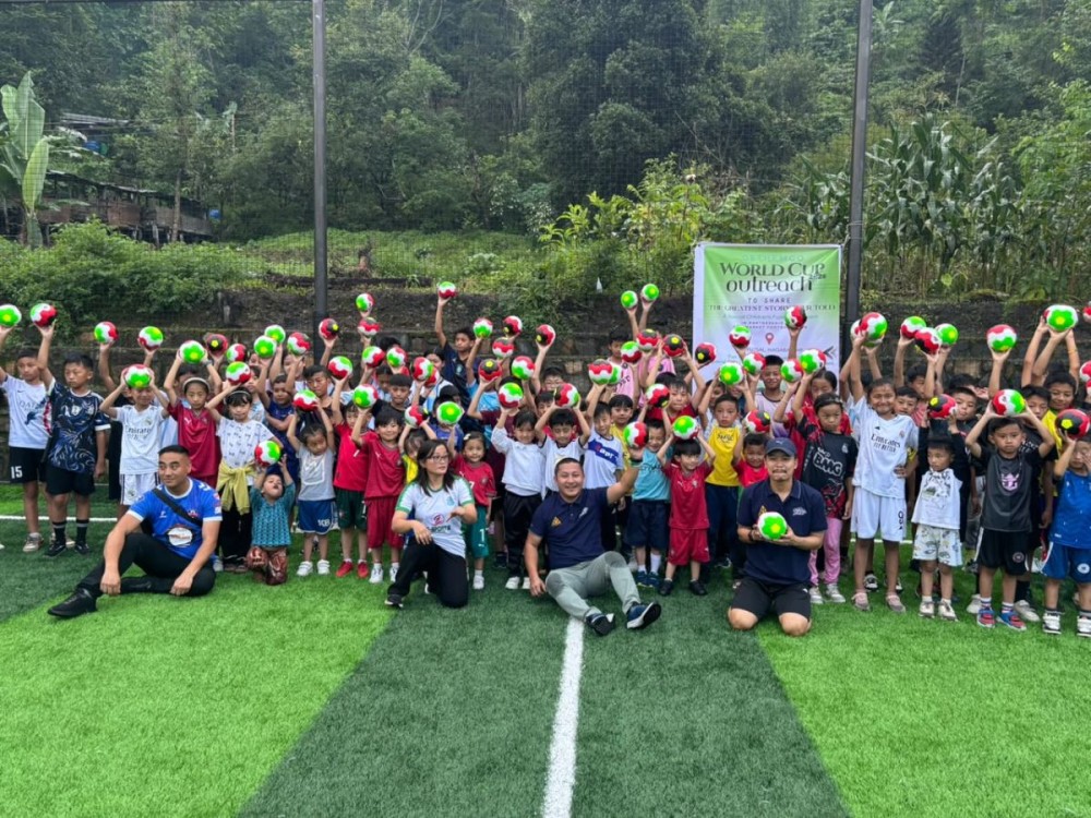 Officials with participants of FIFA World Cup Children’s Outreach in Kohima on July 14.